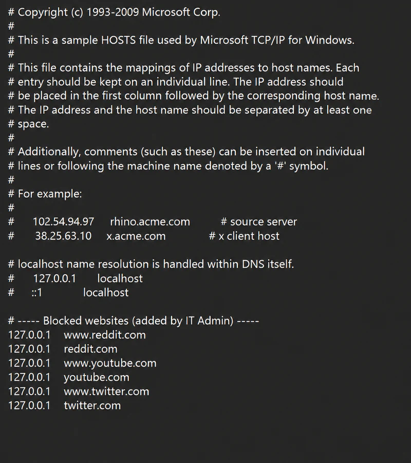 Windows hosts file with website-blocking entries added below the existing content